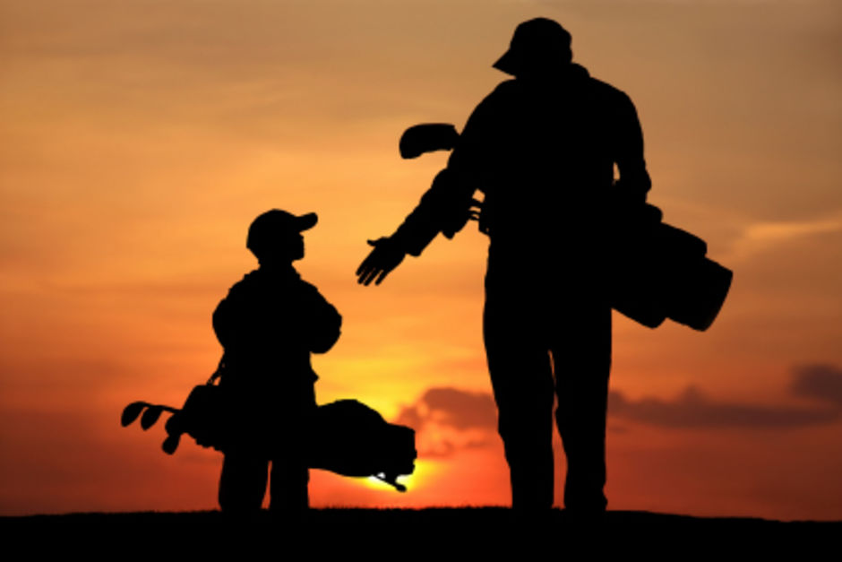 Guiding the young golfer